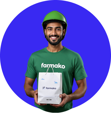 Farmako delivery person holding a bag