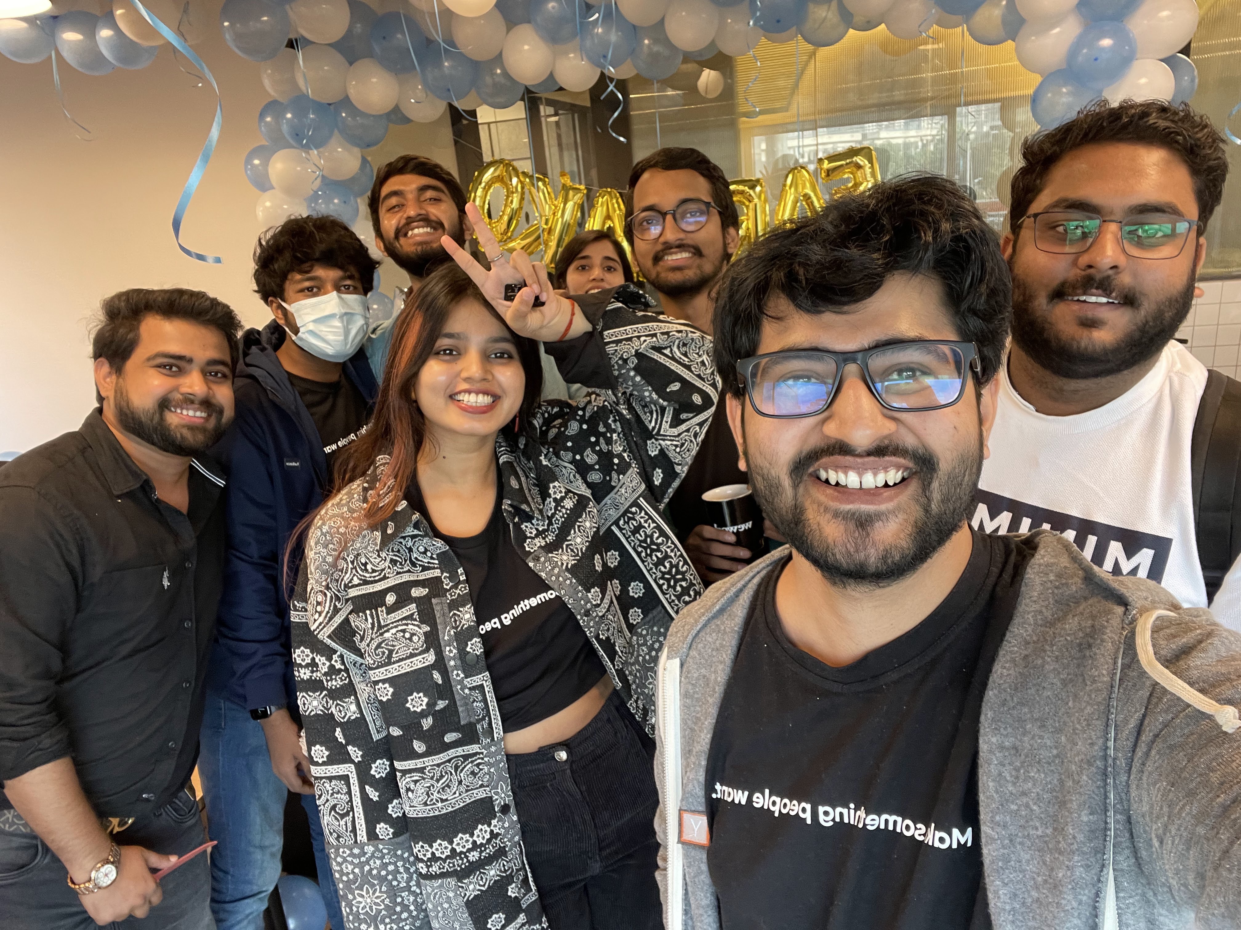 Team celebration selfie with balloons