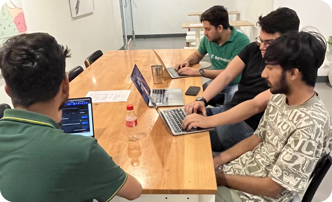 Engineers working together at a desk